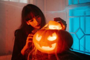 woman and jackolantern